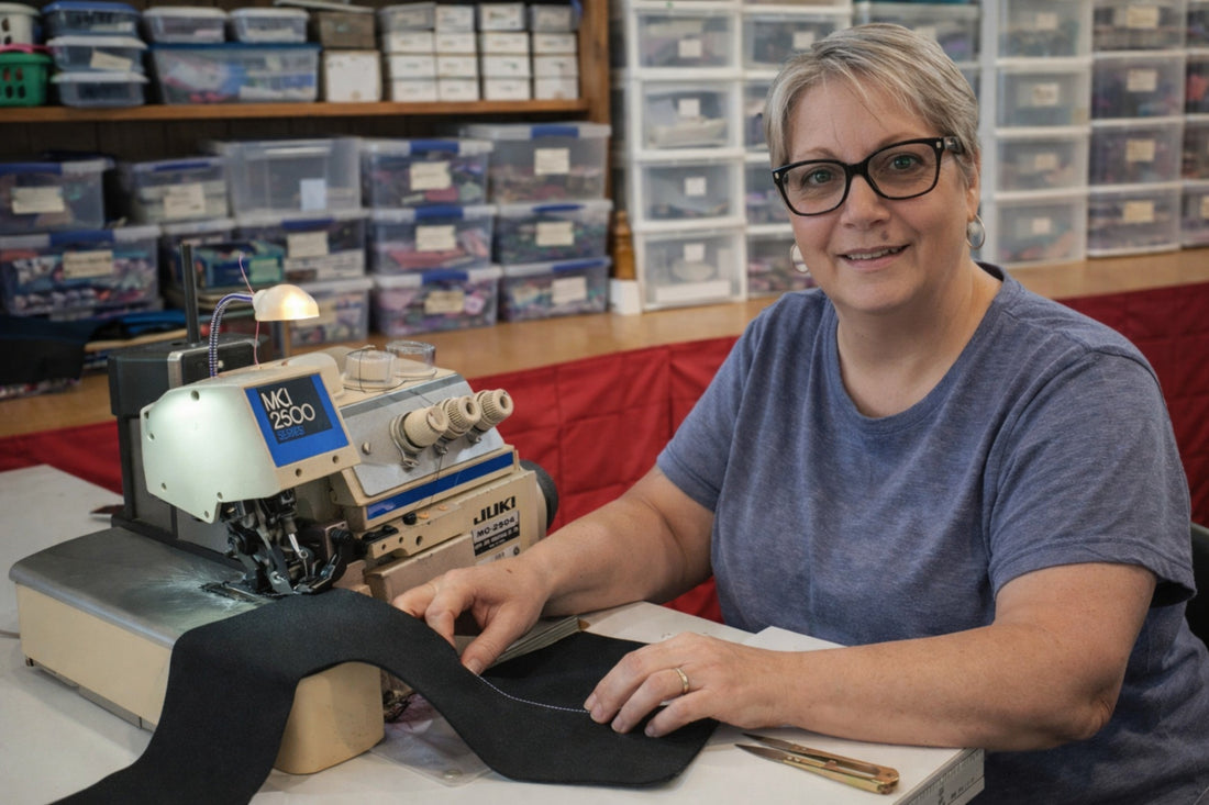 Canadian artisan handcrafting premium washable dog diapers on industrial sewing machine at Jack & Jill Dog Diapers workshop