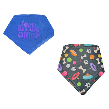 Reversible dog bandana — playful print on one side, solid blue with 'Love Rescued Me' saying on the other, snap-on water resistant