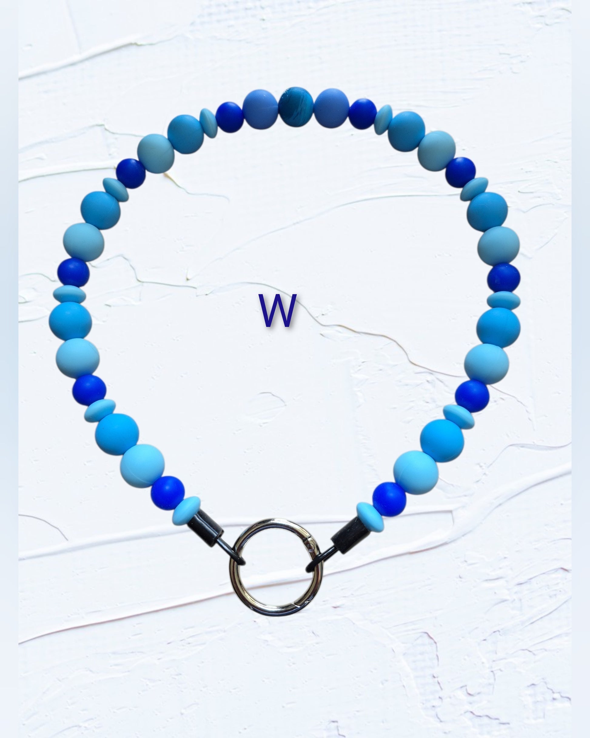 cobalt blue, sky blue and light blue mixed-size beads with silver O-ring clasp