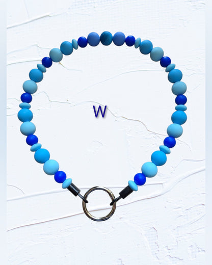 cobalt blue, sky blue and light blue mixed-size beads with silver O-ring clasp