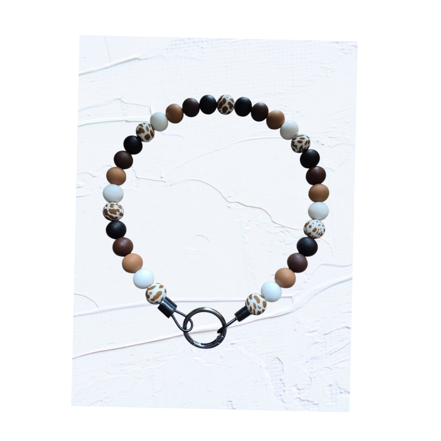 21 inch silicone beaded dog collars handmade in Canada – group shot showing Colour V in black, brown and leopard print and Colour W in blue tones, with O-ring clasps