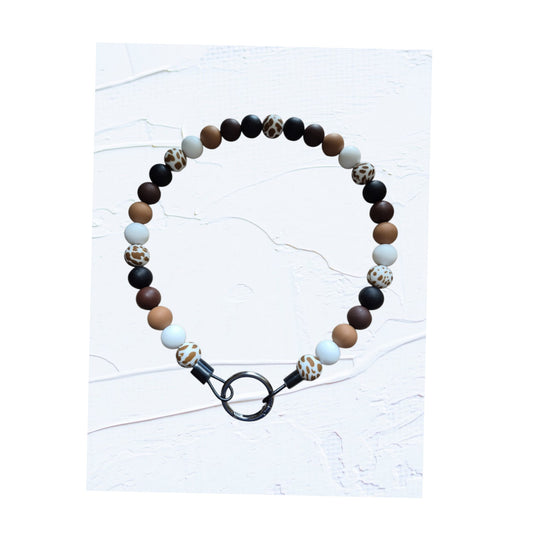 21 inch silicone beaded dog collars handmade in Canada – group shot showing Colour V in black, brown and leopard print and Colour W in blue tones, with O-ring clasps